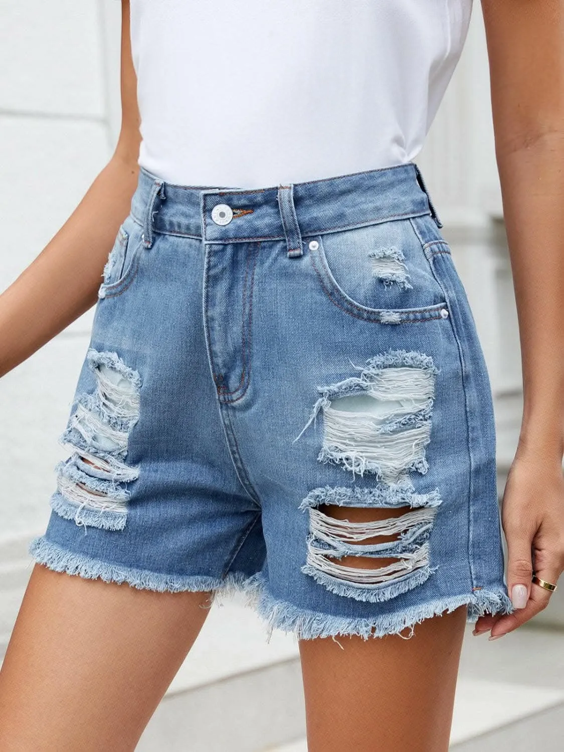 Edgy distressed denim shorts