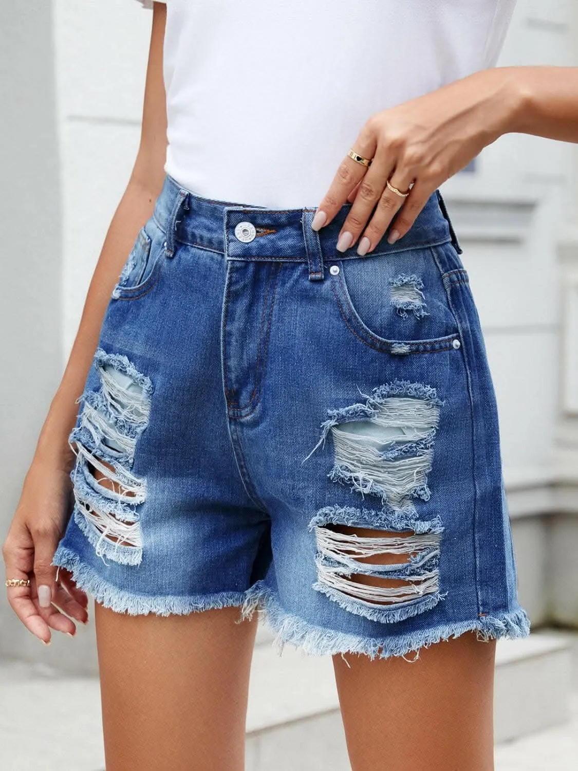 Edgy distressed denim shorts